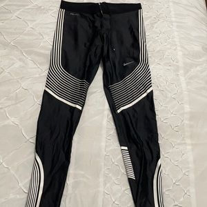 Like new! Small Nike running leggings with back zip pocket and drawstring waist